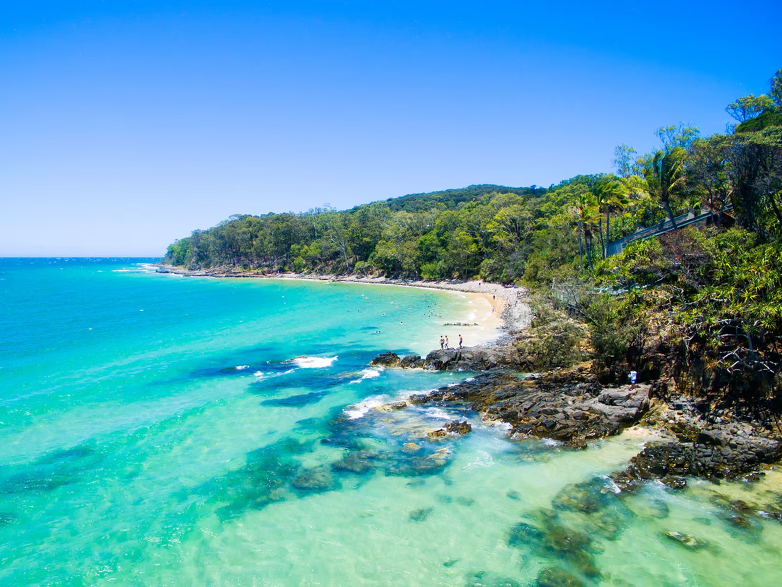 Turquoise water and rocky headland along the Queensland coast