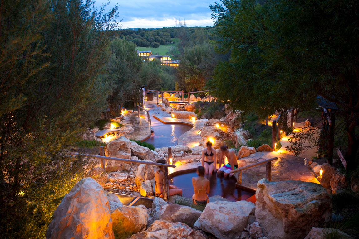 People relaxing in natural hot springs near Melbourne